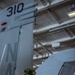 Nimitz Sailor Conducts Maintenance on Aircraft