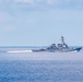 The USS Curtis D. Wilbur Steams Near the USS Nimitz
