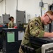 Armory to Action: 379th ESFS Gear Up for Duty