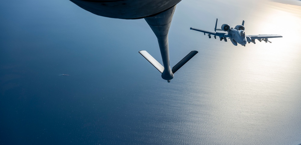 Stratotanker Refuels Thunderbolt in the Night Sky