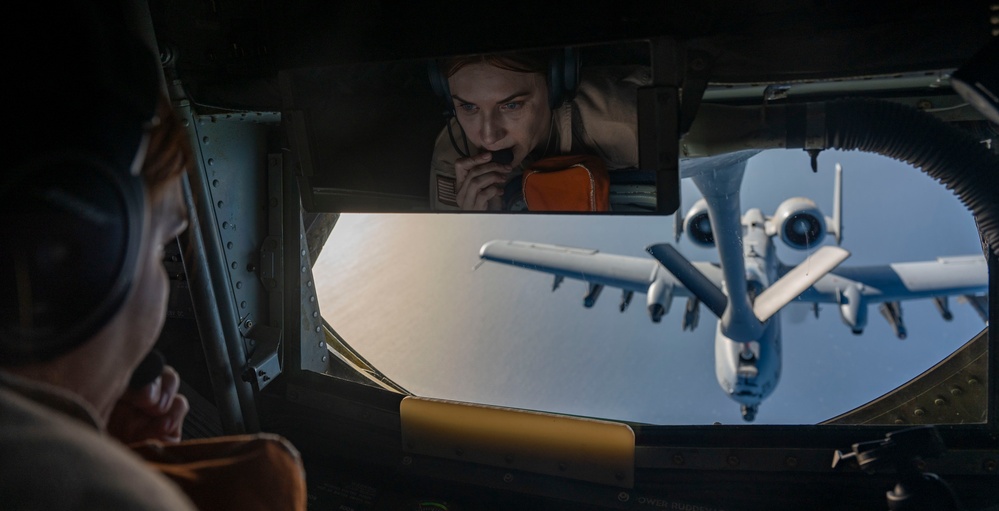 Stratotanker Refuels Thunderbolt in the Night Sky