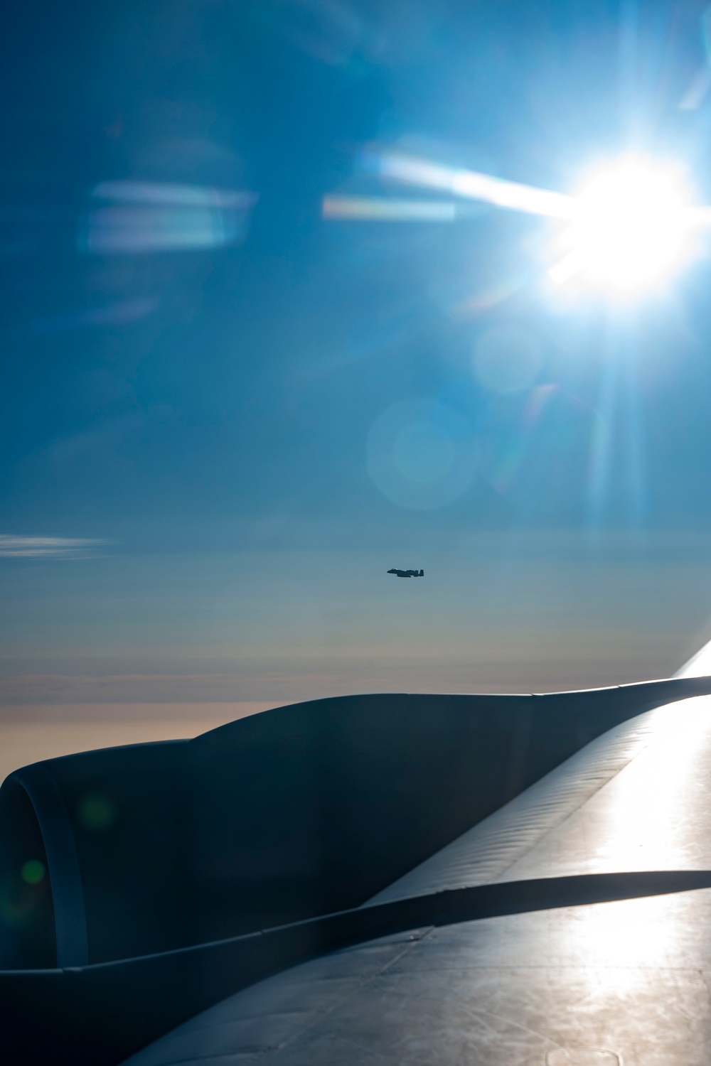 Stratotanker Refuels Thunderbolt in the Night Sky