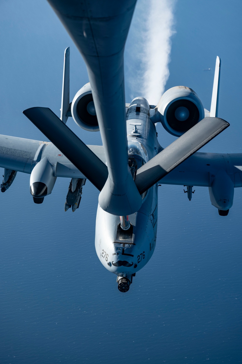 Stratotanker Refuels Thunderbolt in the Night Sky