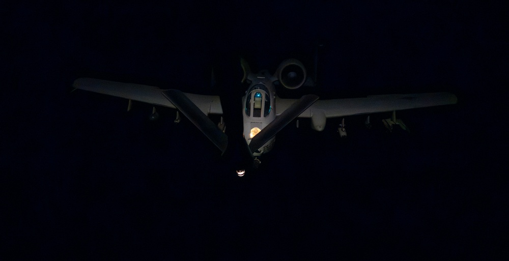 Stratotanker Refuels Thunderbolt in the Night Sky