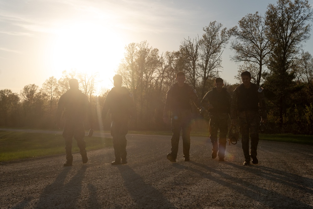 Army Reserve Best Medic Competitors walk on the road