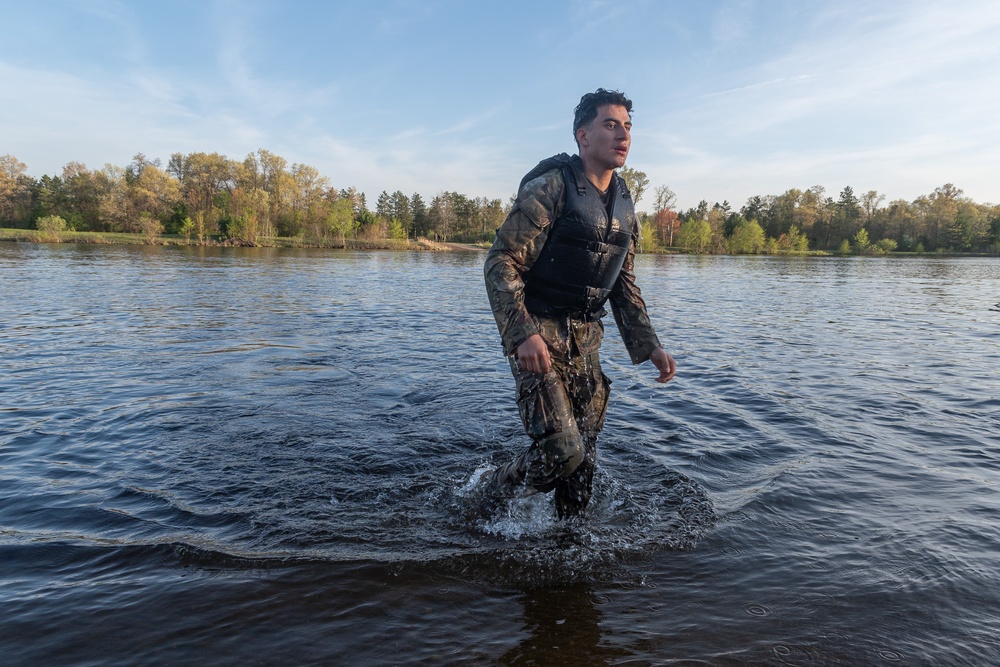Pfc. Alexander Vasquez-Cortes emerges from the water
