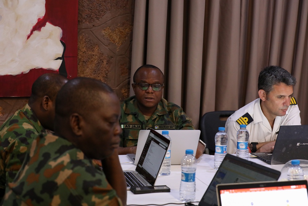 Participants Simulate Scenarios in the Exercise Control Group Duirng Obangame Express 2025