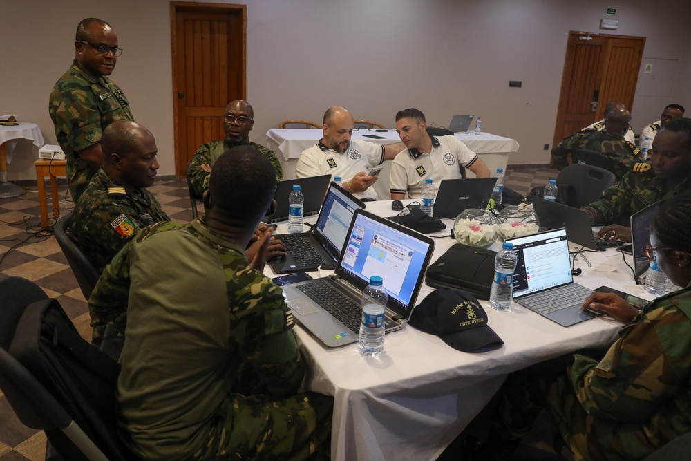 Participants Simulate Scenarios in the Exercise Control Group Duirng Obangame Express 2025