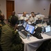 Participants Simulate Scenarios in the Exercise Control Group Duirng Obangame Express 2025