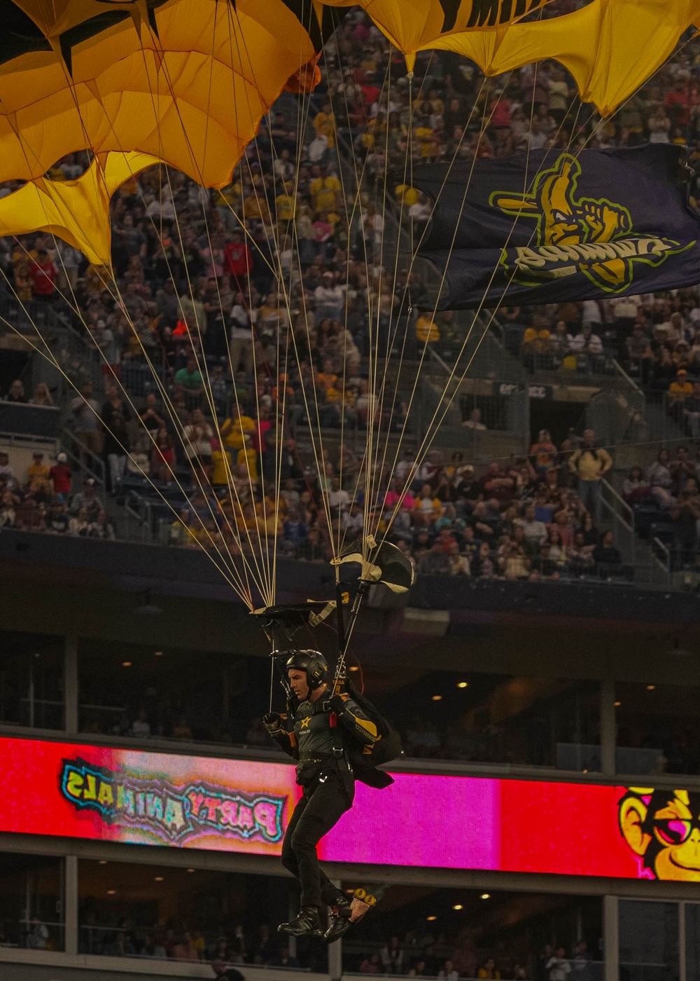U.S. Army Parachute Team Skydives Into Nissan Stadium For Savannah Bananas Ballgame