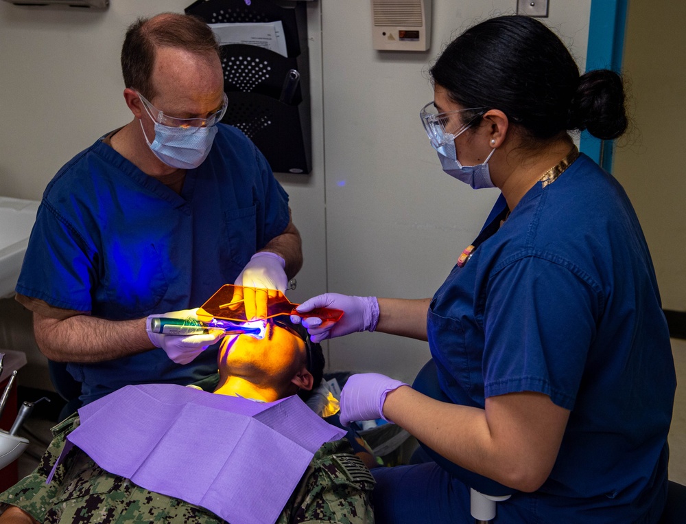 USS John C. Stennis (CVN 74) Sailor receives dental work