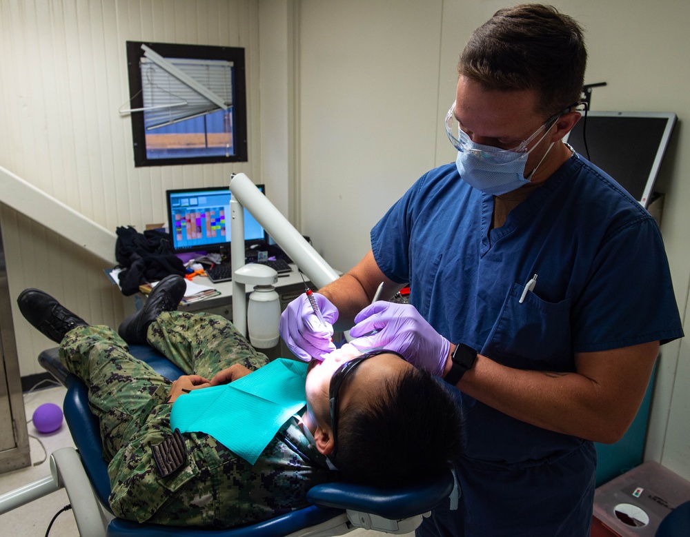 USS John C. Stennis (CVN 74) Sailor recieves dental work