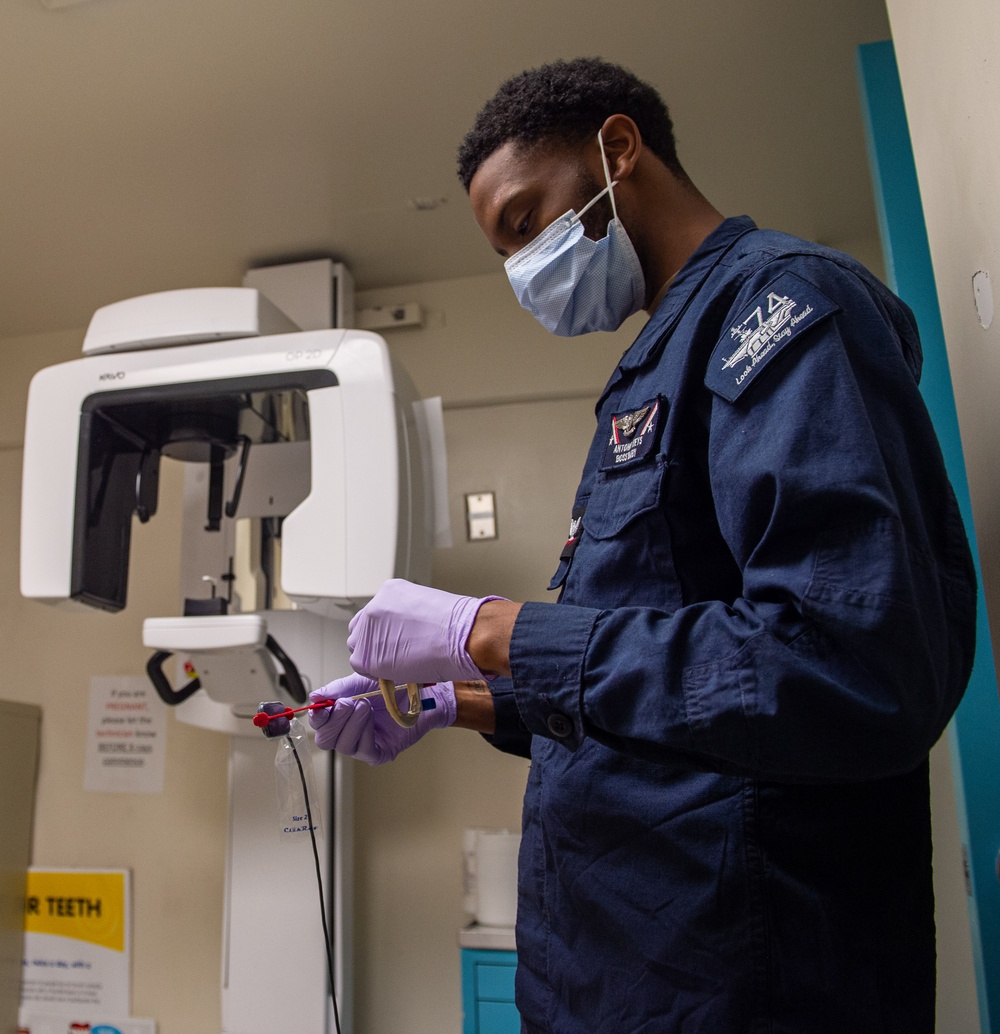USS John C. Stennis (CVN 74) Sailor receives dental work