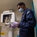 USS John C. Stennis (CVN 74) Sailor receives dental work