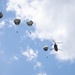 Soldiers from 82nd Airborne Division jump from a CH-47 Chinook to earn their foreign wings