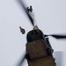 Soldiers from 82nd Airborne Division jump from a CH-47 Chinook to earn their foreign wings