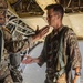 Soldiers from 82nd Airborne Division jump from a CH-47 Chinook to earn their foreign wings