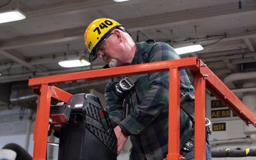 USS Ronald Reagan (CVN 76) Sailors, Puget Sound Naval Shipyard (PSNS) workers, and contractors conduct routine operations and ship maintenance