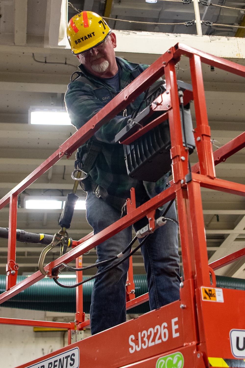 USS Ronald Reagan (CVN 76) Sailors, Puget Sound Naval Shipyard (PSNS) workers, and contractors conduct routine operations and ship maintenance