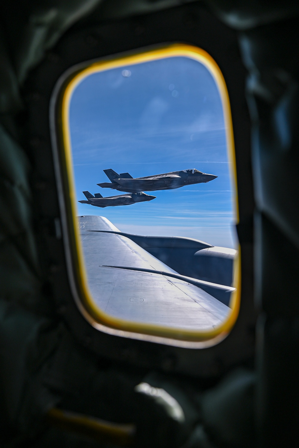 Fairchild AFB KC-135 Stratotanker refuels F-15s and F-35s
