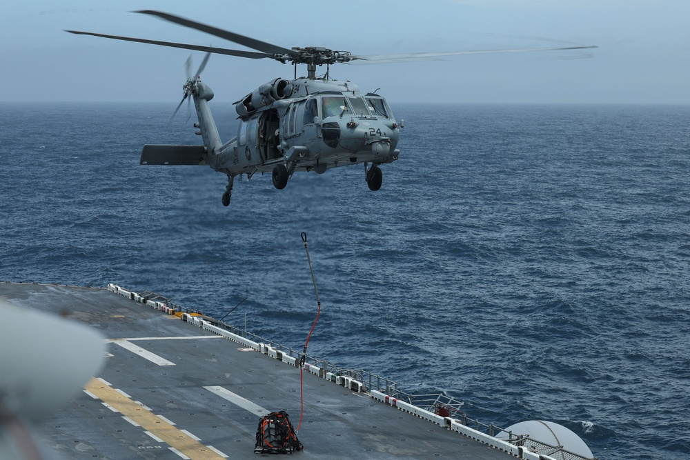 USS Iwo Jima and HSC-26 Conduct Vertical Replenishment Training