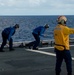 U.S. Coast Guard Cutter Stratton crew train with a Navy MH-60R Seahawk helicopter crew from Andersen Air Force Base on the Pacific Ocean near Guam