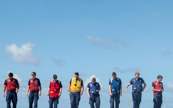 U.S. Coast Guard Cutter Stratton crew train with a Navy MH-60S Seahawk helicopter crew from Andersen Air Force Base on the Pacific Ocean near Guam