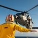 U.S. Coast Guard Cutter Stratton crew train with a Navy MH-60R Seahawk helicopter crew from Andersen Air Force Base on the Pacific Ocean near Guam