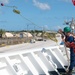 U.S. Coast Guard Cutter Stratton crew moor the Stratton at U.S. Coast Guard Forces Micronesia Sector Guam