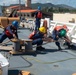 U.S. Coast Guard Cutter Stratton crew moor the Stratton at U.S. Coast Guard Forces Micronesia Sector Guam