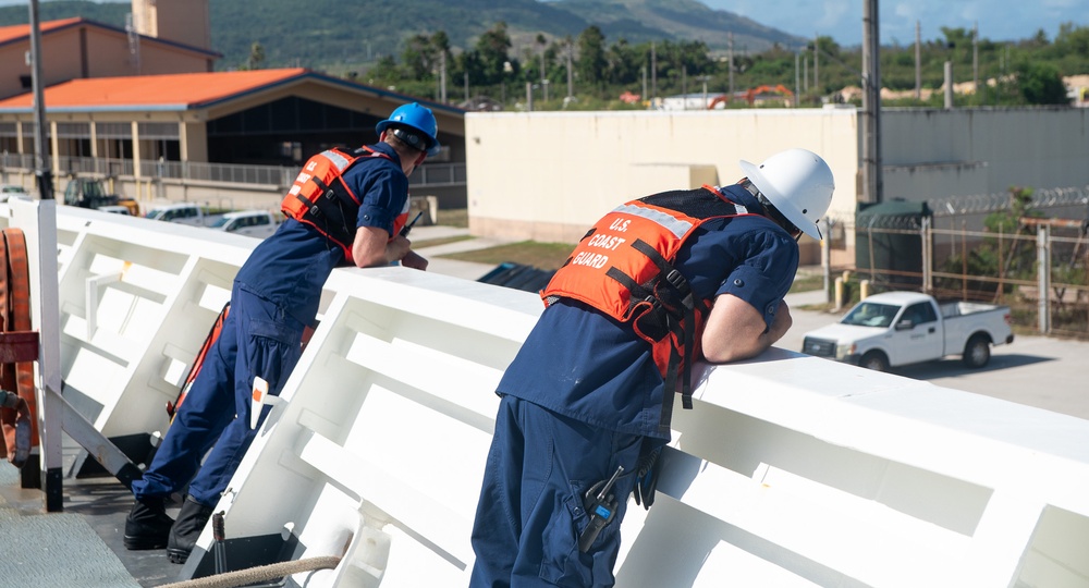 U.S. Coast Guard Cutter Stratton crew moor the Stratton at U.S. Coast Guard Forces Micronesia Sector Guam