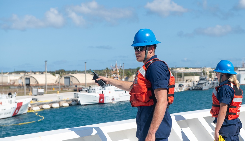 U.S. Coast Guard Cutter Stratton crew moor the Stratton at U.S. Coast Guard Forces Micronesia Sector Guam