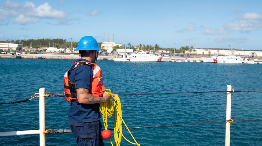 U.S. Coast Guard Cutter Stratton crew moor the Stratton at U.S. Coast Guard Forces Micronesia Sector Guam