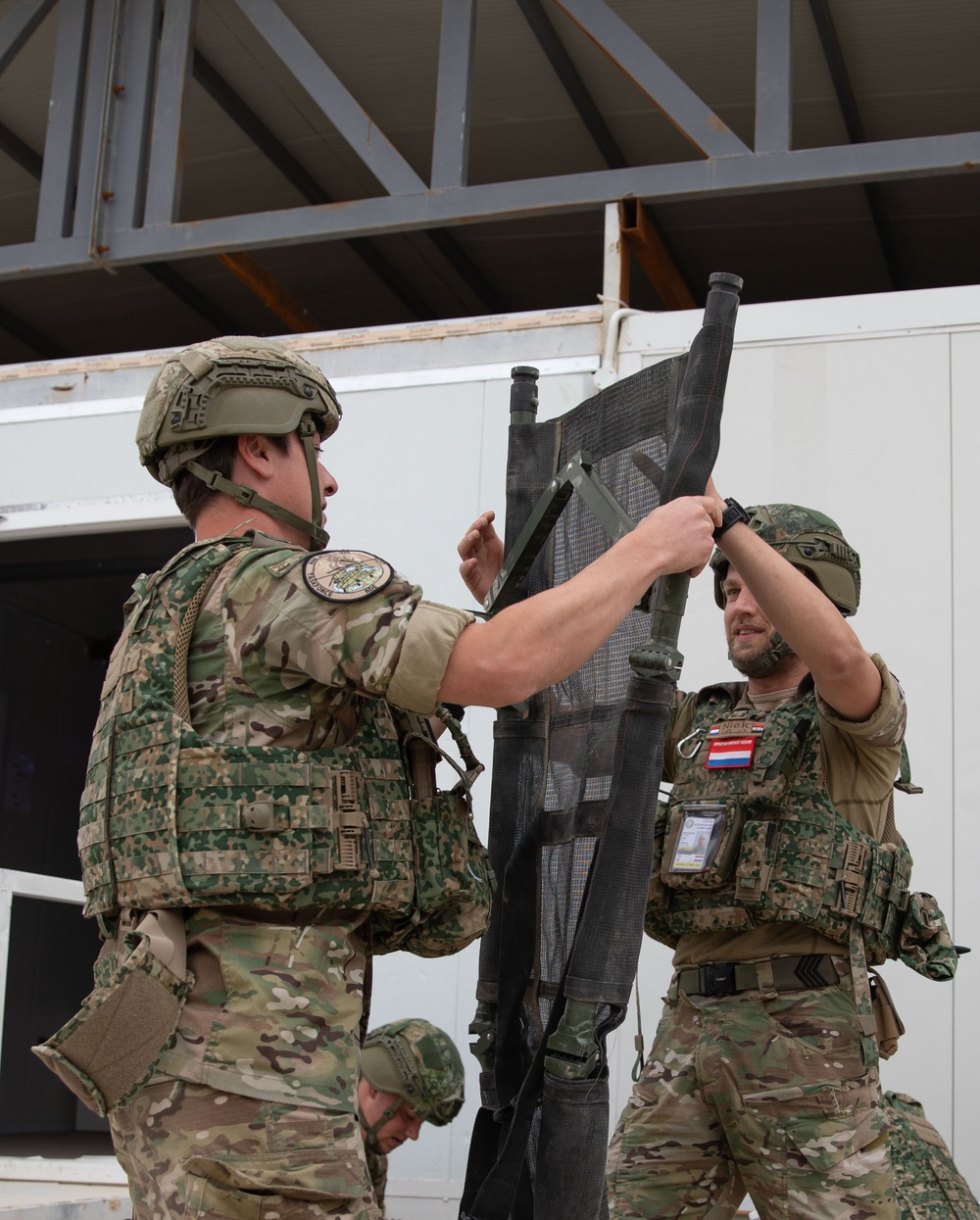 Coalition Forces Conduct Base Defense Exercise at AAAB