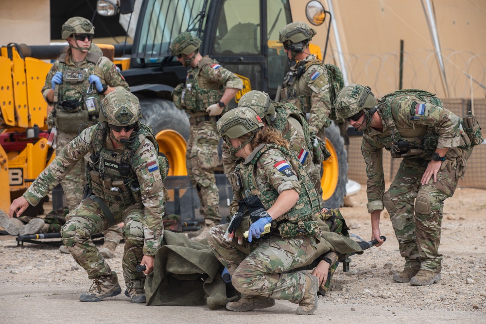 Coalition Forces Conduct Base Defense Exercise at AAAB