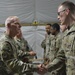 56th SBCT presents coins to GTA range operations