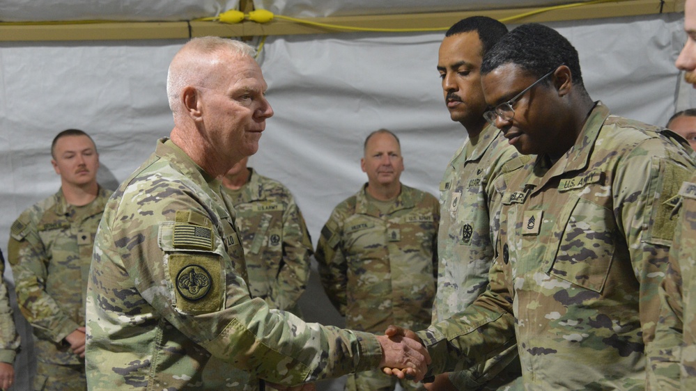 56th SBCT presents coins to GTA range operations
