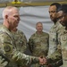 56th SBCT presents coins to GTA range operations