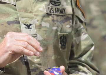 56th SBCT presents coins to GTA range operations