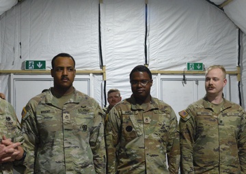 56th SBCT presents coins to GTA range operations