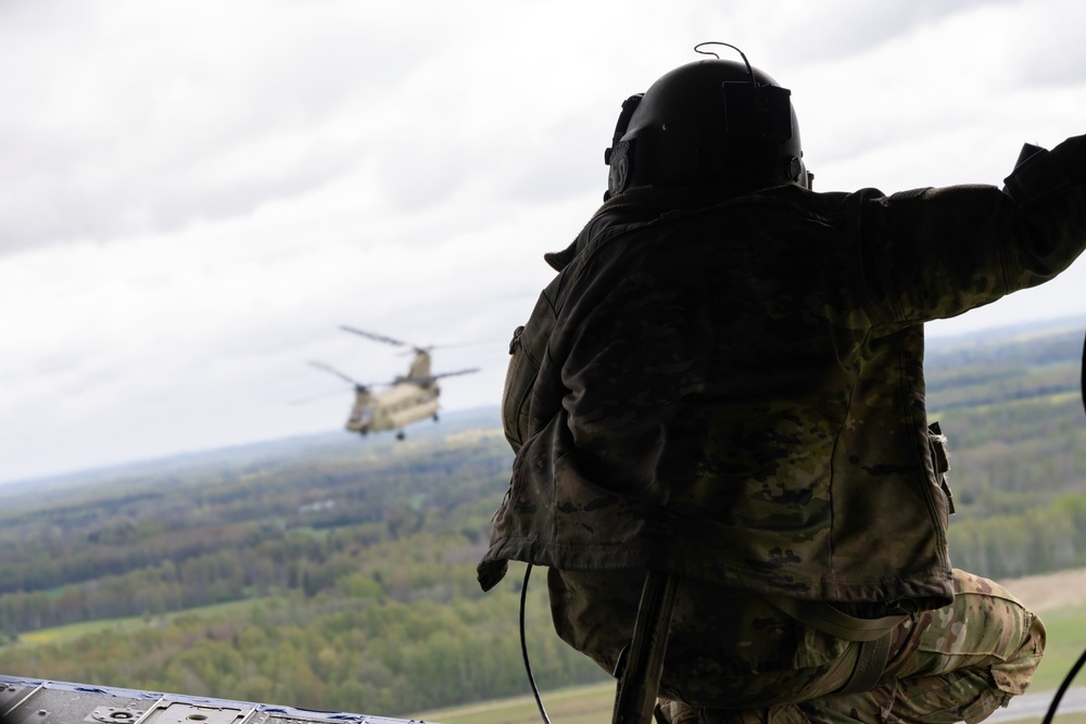 Special Forces and Army Aviators conduct helocast training