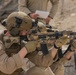 Coalition Members Conduct Weapons Training at Al Asad Air Base