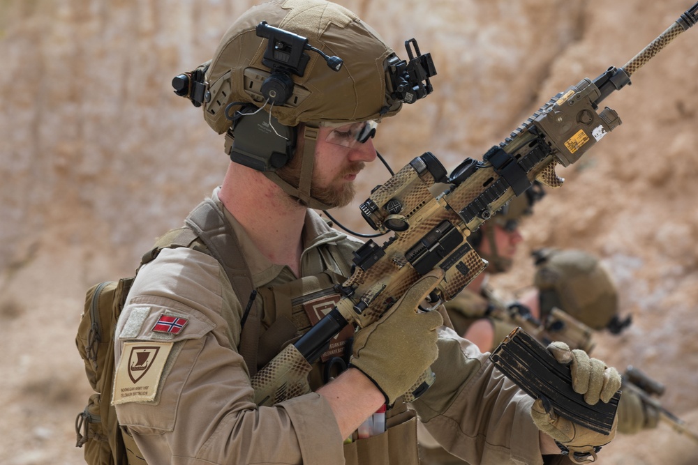 Coalition Members Conduct Weapons Training at Al Asad Air Base