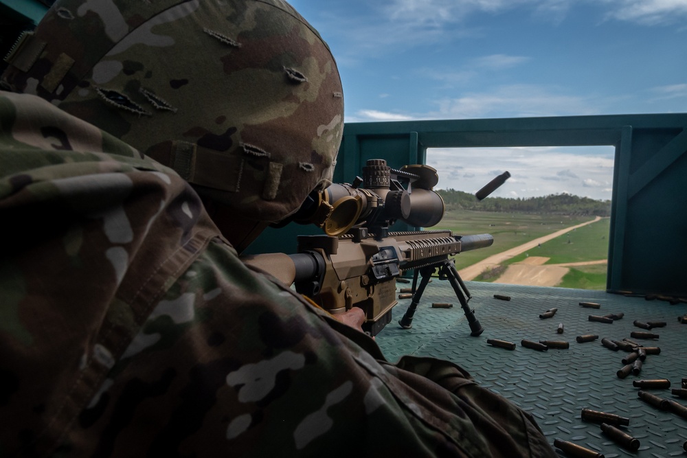 Spc. Cristian Barrueta fires an M110