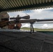 Staff Sgt. Dannys Caballero fires an M110