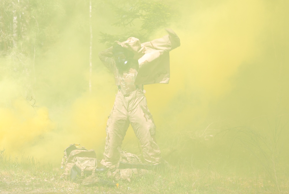 Competitors participate in CBRN Lane during V Corps Best Squad Competition