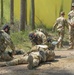 Competitors participate in CBRN Lane during V Corps Best Squad Competition