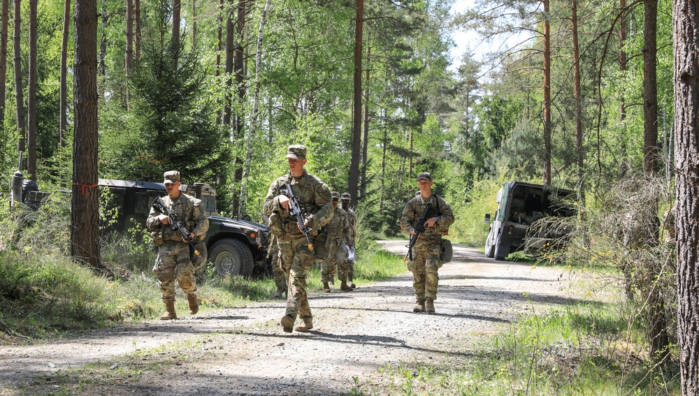 Competitors participate in CBRN Lane during V Corps Best Squad Competition