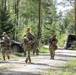 Competitors participate in CBRN Lane during V Corps Best Squad Competition