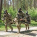 Competitors participate in CBRN Lane during V Corps Best Squad Competition